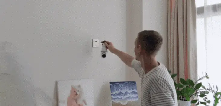 guy installs SafeCam360 inside the house